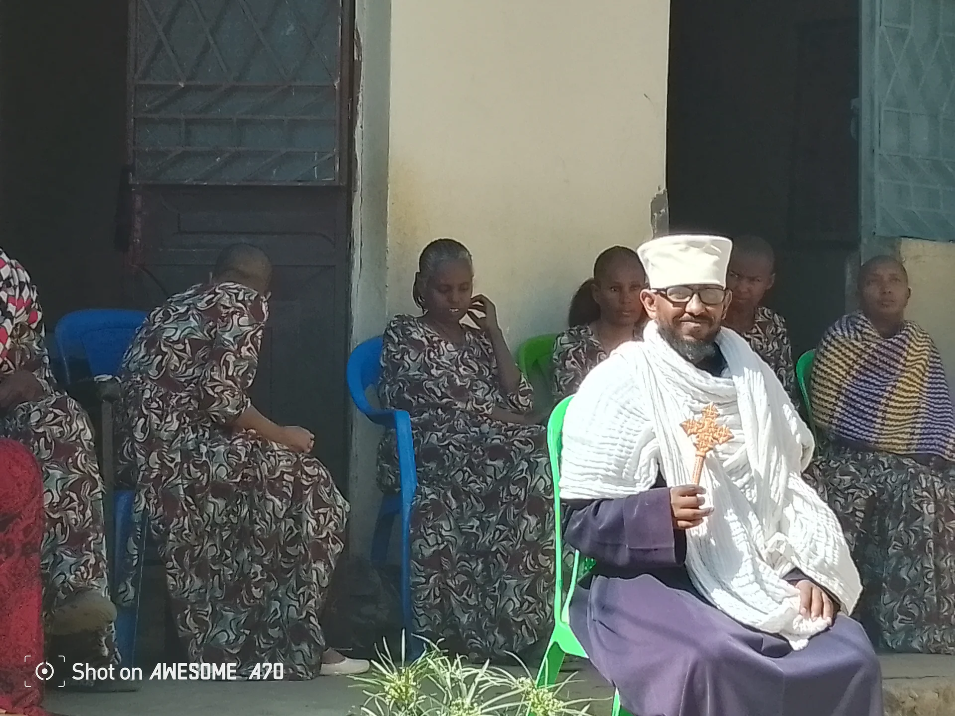 Elder gathering for shared meals, prayers, and community building.
